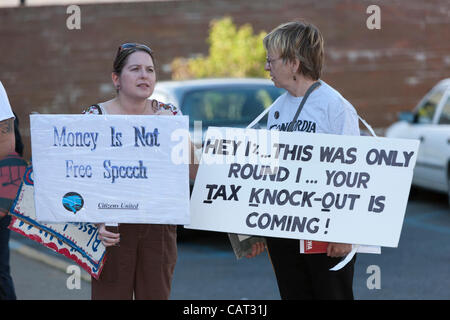 Members of the Communications Workers of America (CWA Local 1103) and MoveOn participate in the Tax the 1% protest at the post office in White Plains, New York, USA on Tuesday, April 17, 2012.  The protest focused on the imbalance of taxation of the middle class vs corporations and the wealthy. Stock Photo