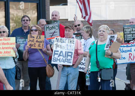 Members of the Communications Workers of America (CWA Local 1103) and MoveOn participate in the Tax the 1% protest at the post office in White Plains, New York, USA on Tuesday, April 17, 2012.  The protest focused on the imbalance of taxation of the middle class vs corporations and the wealthy. Stock Photo