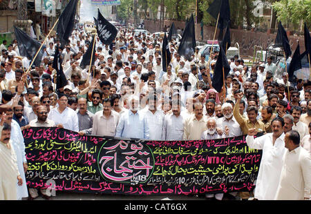 Members of WAPDA Hydro Electric Central Labor Union are protesting against privatization of power companies and in favor of their demands during protest rally in Hyderabad on Wednesday, April 18, 2012. Stock Photo
