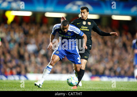 18.04.2012. Stamford Bridge, Chelsea, London. Chelsea's Ashley Cole challenges with Pedro Rodriguez of  FC Barcelona during the Champions League Semi Final 1st  leg match between Chelsea and Barcelona  at Stamford Bridge, Stadium on April 18, 2012 in London, England. Stock Photo