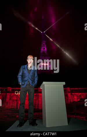 Chris Evans was the host of a special VIP event held at the foot of the tower to mark the switchover. The switch over from analogue to digital TV service’s was marked by a spectacular light show at the Crystal Palace broadcast tower. The show included a beam of light shooting up the tower and radiat Stock Photo