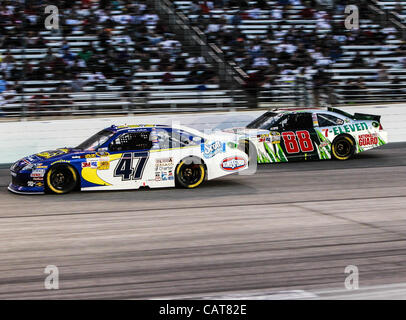 April 14, 2012 - Fort Worth, Texas, United States of America - Sprint Cup Series driver Bobby Labonte (47) and Sprint Cup Series driver Dale Earnhardt Jr. (88) in action during the Nascar Sprint Cup Series Samsung Mobile 500 race at Texas Motor Speedway in Fort Worth,Texas. Sprint Cup Series driver  Stock Photo