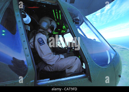 Czech and Croatian helicopter crews undergo training on flight simulator ahead their deployment in ISAF mission in Afghanistan. Training programme at the Mosnov Airport, Ostrava on April 18, 2012. (CTK Photo/Jaroslav Ozana) Stock Photo