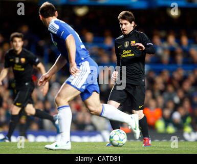 18.04.2012. Stamford Bridge, Chelsea, London.  Lionel Messi of  FC Barcelona and Chelsea's Frank Lampard  during the Champions League Semi Final 1st  leg match between Chelsea and Barcelona  at Stamford Bridge, Stadium on April 18, 2012 in London, England. Stock Photo