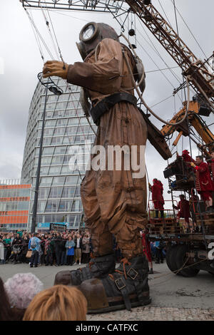 Liverpool, UK, Friday 20th April, 2012. The giant uncle puppet starts his walk around the city of Liverpool on the first of a 3 day event 'Sea Odyssey-Giant Spectacular'. The event helps to commemorate the sinking of the Titanic's 100 year anniversary. Stock Photo