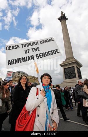 London, UK. Saturday 21st April 2012. Marchers with placards at the Armenian Genocide of 1915 Commemoration March, London. An anti-Turkey demonstration to raise awareness of the Armenian Genocide which has never been acknowledged. Stock Photo