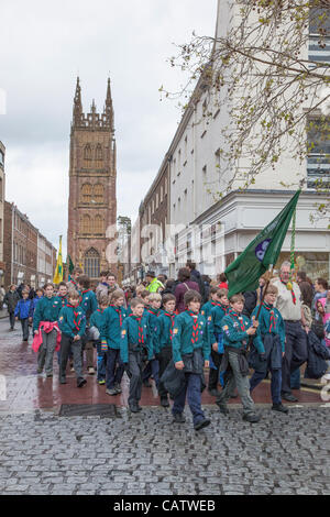 Boy Scouts marching through Taunton town centre, Somerset, England on Sunday 22nd April 2012 to celebrate St. George's day. This annual event is attended by regional Boy Scouts and Girl Guide groups to uphold the tradition of the patron Saint of England. Stock Photo