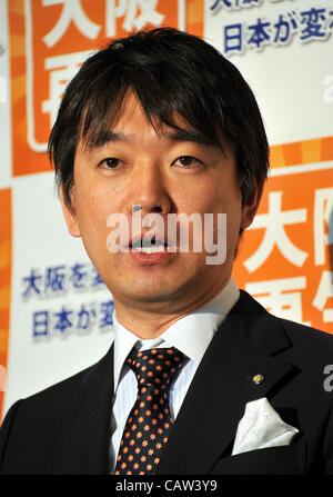 April 24, 2012, Tokyo, Japan - Mayor Toru Hashimoto of Osaka, western Japan, speaks to reporters during an impromptu news conference following his meeting with Chief Cabinet Secretary Oamu Fujimura at the prime ministers official residence in Tokyo on Tuesday, April 24, 2012. Hashimoto, a strong opp Stock Photo