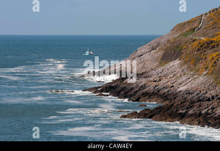 Swansea - UK - 24th April 2012 -  Pollution in the sea at Limeslade Bay this monring in the warm spring weather. Stock Photo