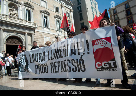 Barcelona,Spain. 1 May,2012. Anarchist CGT Union commemorate May Day and protest in front of the  Generalitat  Palace (Catalonia Government building )   the arrest of his partner Laura Gomez arrested during the general strike on March 29 against the new labor reform law. Stock Photo