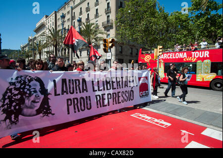 Barcelona,Spain. 1 May,2012. Anarchist CGT Union commemorate May Day and protest  the  the arrest of his partner Laura Gomez arrested during the general strike on March 29 against the new labor reform law. Stock Photo
