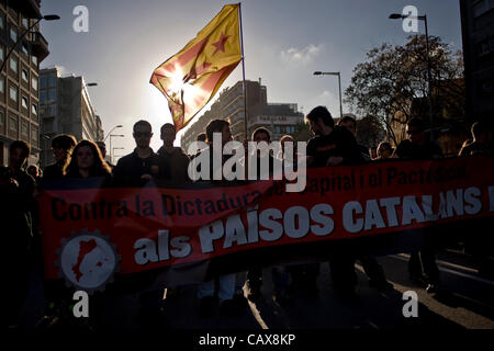 01 may, 2012- Barcelona, Spain. A catalan flag with the star (symbol of independence) during the celebration of the alternative demonstration of May Day formed by   minority unions and with the presence of a large police deployment. Stock Photo