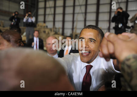 US President Barack Obama greets military personnel gathered May 2, 2012 at Bagram Air Field, Afghanistan. The president arrived on a surprise visit to Afghanistan to sign an agreement with Afghan President Hamid Karzai setting the path for the eventual withdrawal of US forces. Stock Photo