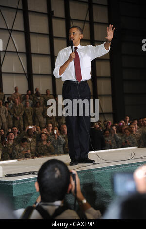 US President Barack Obama addresses military personnel gathered May 2, 2012 at Bagram Air Field, Afghanistan. The president arrived on a surprise visit to Afghanistan to sign an agreement with Afghan President Hamid Karzai setting the path for the eventual withdrawal of US forces. Stock Photo