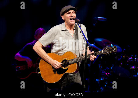 James Taylor pictured in concert at the Bozar Auditorium, Brussels. James Vernon Taylor (born March 12, 1948) is an American singer-songwriter and guitarist. A five-time Grammy Award winner, Taylor was inducted into the Rock & Roll Hall of Fame in 2000. Stock Photo