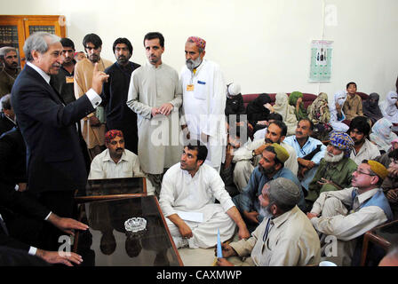 Supreme Court Bar Association (SCBA) President, Yaseen Azad talks with relatives of missing persons during meeting at high court in Quetta on Friday, May 04, 2012. Stock Photo