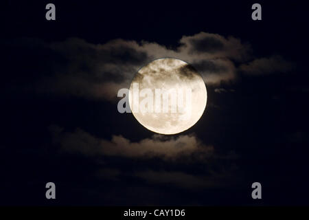 Perigree full moon, or supermoon, rises over Colorado, USA. Moon is closer to earth in orbit than normal. Stock Photo