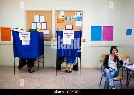 Greek Elections. Kolonaki, Athens, Greece. 06.05.2012 Image shows Greek people voting inside the booths at a Polling Station on election day in the wealthy neighbourhood of Kolonaki, Athens, Greece. Stock Photo