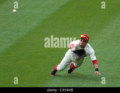 CLEVELAND, OH USA - MAY 6:  Cleveland Indians right fielder Shin-Soo Choo (17) makes a diving catch on a ball hit by Texas Rangers third baseman Adrian Beltre (29) during the ninth inning at Progressive Field in Cleveland, OH, USA on Sunday, May 6, 2012. Stock Photo