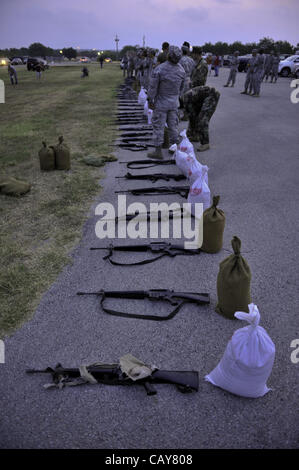 May 5, 2012 - DoD K9 Trials-May 4, 2012-Lackland Air Force Base-San Antonio, Texas---Mock weapons and sandbags to be placed in soldiers backpacks prior to the start of the grueling 6 mile Iron Dog Competition during the Department of Defense K9 Trials at Lackland Air Force Base in San Antonio, Texas Stock Photo