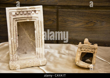 Clay and stone cultic artifacts found in Khirbet Qeiyafa excavations displayed at Hebrew University assembled press conference interpreted by Prof. Yosef Garfinkel as “Ark of God” models. Jerusalem, Israel. 8-May-2012. Stock Photo