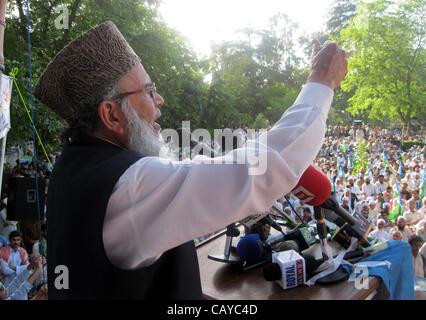 Jamat-e-Islami (JI) Ameer, Syed Munawar Hassan addresses to a public meeting held at Jinnah Bagh in Abbottabad on Tuesday, April 24, 2012. Stock Photo