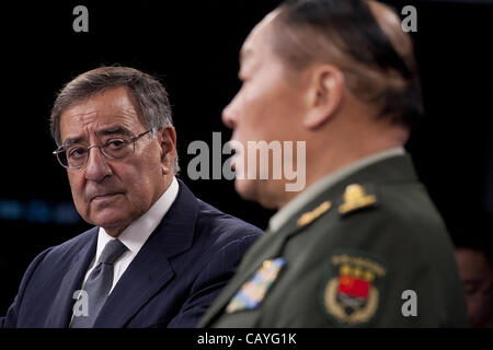 Defense Secretary Leon E. Panetta listens to China’s Minister of National Defense Gen. Liang Guanglie during a joint press conference at the Pentagon May 7, 2012 in Pentagon City, VA. Stock Photo