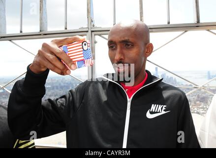 May 10, 2012 - Manhattan, New York, U.S. - ABDI ABDIRAHMAN of the U.S. Men's Olympic Marathon Team visits the 86th floor observatory of the Empire State Building ahead of the summer 2012 Olympic Games in London. (Credit Image: © Bryan Smith/ZUMAPRESS.com) Stock Photo