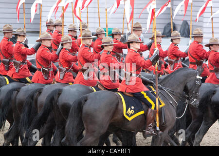 Thursday 10th May 2012. The Royal Canadian Mounted Police (Mounties) perform the Musical Ride at the Royal Windsor Horse Show 2012. Windsor Park, Berkshire, England, United Kingdom. Stock Photo