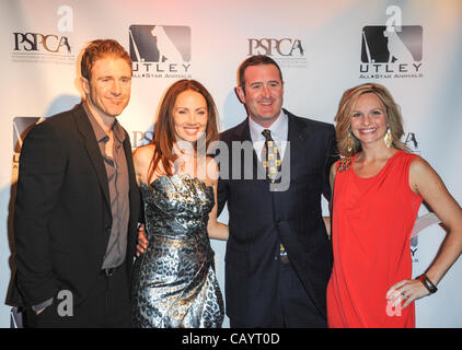 May 10, 2012 - Philadelphia, Pennsylvania, U.S - Phillies CHASE UTLEY wife JENNIFER, with Phillies BRIAN SCHNEIDER and wife, at the 5th annual a Chase Utley All-Star Animals Casino Night that was held at the world famous Electric Factory.  The event is held to support the Pennsylvania SPCA efforts t Stock Photo