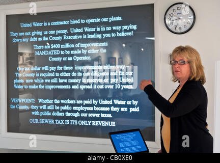 Speaking against Nassau County Executive’s Plan to Privatize Sewage Treatment Plants are Claudia Borecky (shown) President of North and Central Merrick Civic Assoc., and County Legislator Dave Denenberg (Democrat - Merrick) on Wednesday, May 16, 2012, at Bellmore Library, New York, USA. Stock Photo