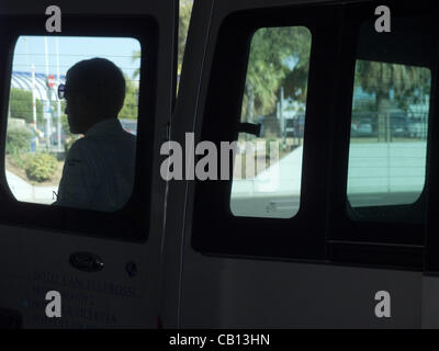 Airport shuttle bus driver at airport in Rome, Italy Stock Photo