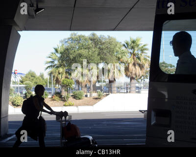 Airport shuttle bus driver at airport in Rome, Italy Stock Photo