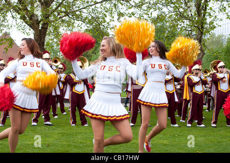 18 May 2012 London UK, Cheerleaders perform in front of The University of Southern California Trojans Marching Band Stock Photo