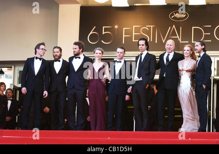 May 19, 2012 - Cannes, France - CANNES, FRANCE - MAY 19: (L-R) Guy Pearce, Tom Hardy, Jason Clarke, Mia Wasikowska, Dane DeHaan, Nick Cave, director John Hillcoat, Jessica Chastain and Shia LaBeouf attend the 'Lawless' Premiere during the 65th Annual Cannes Film Festival at Palais des Festivals on M Stock Photo
