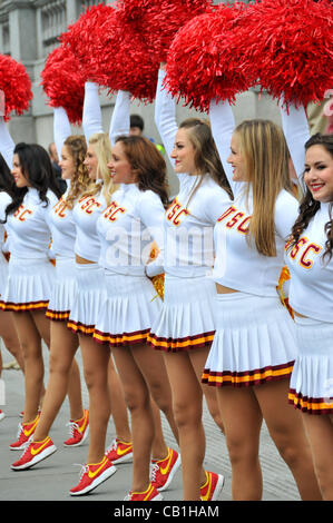 London, UK. 20/05/2012. Cheerleaders of the University of Southern California (USC), Trojans Football Team Marching Band perform in Trafalgar Square. Stock Photo