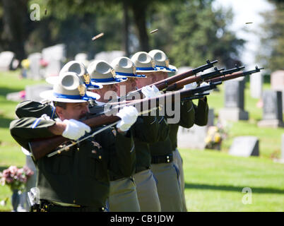 May 2, 2012 - Modesto, CA, USA - The California Highway Patrol Honor Guard fires a 21 gun salute during the Stanislaus County Peace officers Memorial at Lakewood Memorial Park. Law enforcement members from throughout Stanislaus County honored the fallen peace officers and deputies during a memorial  Stock Photo