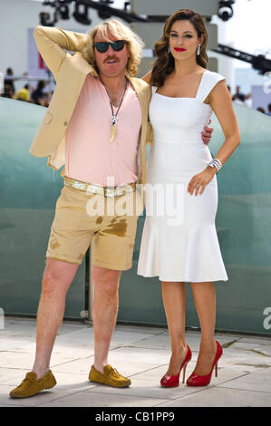 Leigh Francis (comedian) in character as Keith Lemon, with Kelly Brook (actress) at photocall for film 'Keith Lemon - The Film' 65th Cannes Film Festival 2012 Martinez Hotel, Cannes, France Sat 19th May 2012 Stock Photo