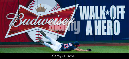 CLEVELAND, OH USA - MAY 22:  Cleveland Indians left fielder Johnny Damon (33) makes a play on Detroit Tigers first baseman Prince Fielder (28) during the first inning at Progressive Field in Cleveland, OH, USA on Tuesday, May 22, 2012. Stock Photo