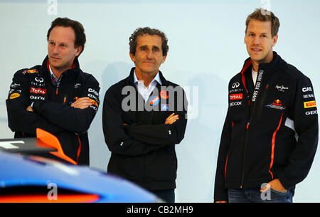 25.05.2012. Monte Carlo, Monaco.  German Formula One driver Sebastian Vettel (R) of Red Bull, the four-time Formula One World Champion, Alain Prost (C) and the team principal of Red Bull, British Christian Horner (L), are seen during the presentaion of the new Renault Alpine A110-50 concept-car at t Stock Photo