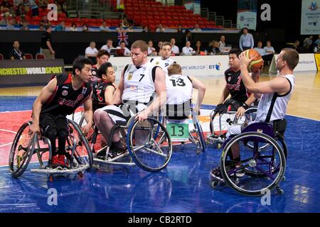 26.05.2012 Manchester, England. Germany and Japan in action during the Wheelchair Basketball at BT Paralympic World Cup from Sportscity. Germany beat Japan 63-49 thanks to an 18-point performance from Andre Bienek Stock Photo