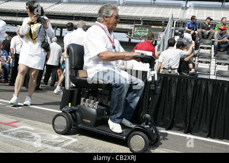 May 26, 2012 - Indianapolis, Indiana, U.S - IZOD Indycar Series, Indy 500, Indianapolis, IN, Qualifying, Practice, May 18-27 2012, MARIO ANDRETTI tests former his former team boss ANDY GRANATELLI scooter. (Credit Image: © Ron Bijlsma/ZUMAPRESS.com) Stock Photo