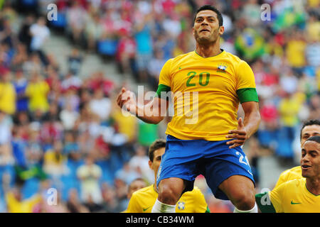 26.05.2012. Hamburg, Germany.  Brazil's Romulo cheers after scoring the 1-0 goal during the international friendly soccer match between Denmark and Brazil at Imtech Arena in Hamburg, Germany, 26 may 2012. Stock Photo