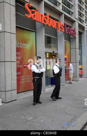 Monday 28th May 2012 Pay Up group hold their first direct action, The Fetter Lane branch of Sainsbury's was the groups first target , calling on the company to pay staff a living wage.  Credit Line : Credit:  HOT SHOTS / Alamy Live News Stock Photo