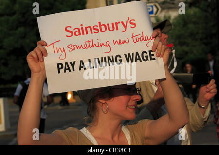 Monday 28th May 2012 Pay Up group hold their first direct action, Their target was Sainsbury's calling on the company to pay its workers a living wage. Credit Line : Credit:  HOT SHOTS / Alamy Live News Stock Photo
