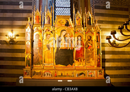 Polyptych (1400) by by Andrea Vanni showing the Virgin and the infant Jesus holding a Goldfinch, surrounded by saints, Siena Baptistry, Tuscany, Italy Stock Photo