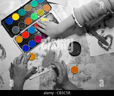 Hands of Children Painting in Art Class Stock Photo - Alamy