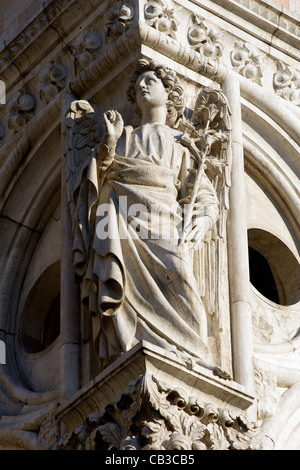 Venice - Archangel Gabriel from external corner of facade of Doge palace Stock Photo