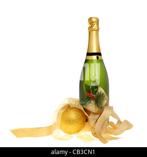 Christmas champagne bottle decorated with holly, gold ribbons and a golden bauble isolated against white Stock Photo