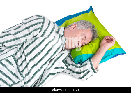 Senior man in pajamas isolated in white Stock Photo